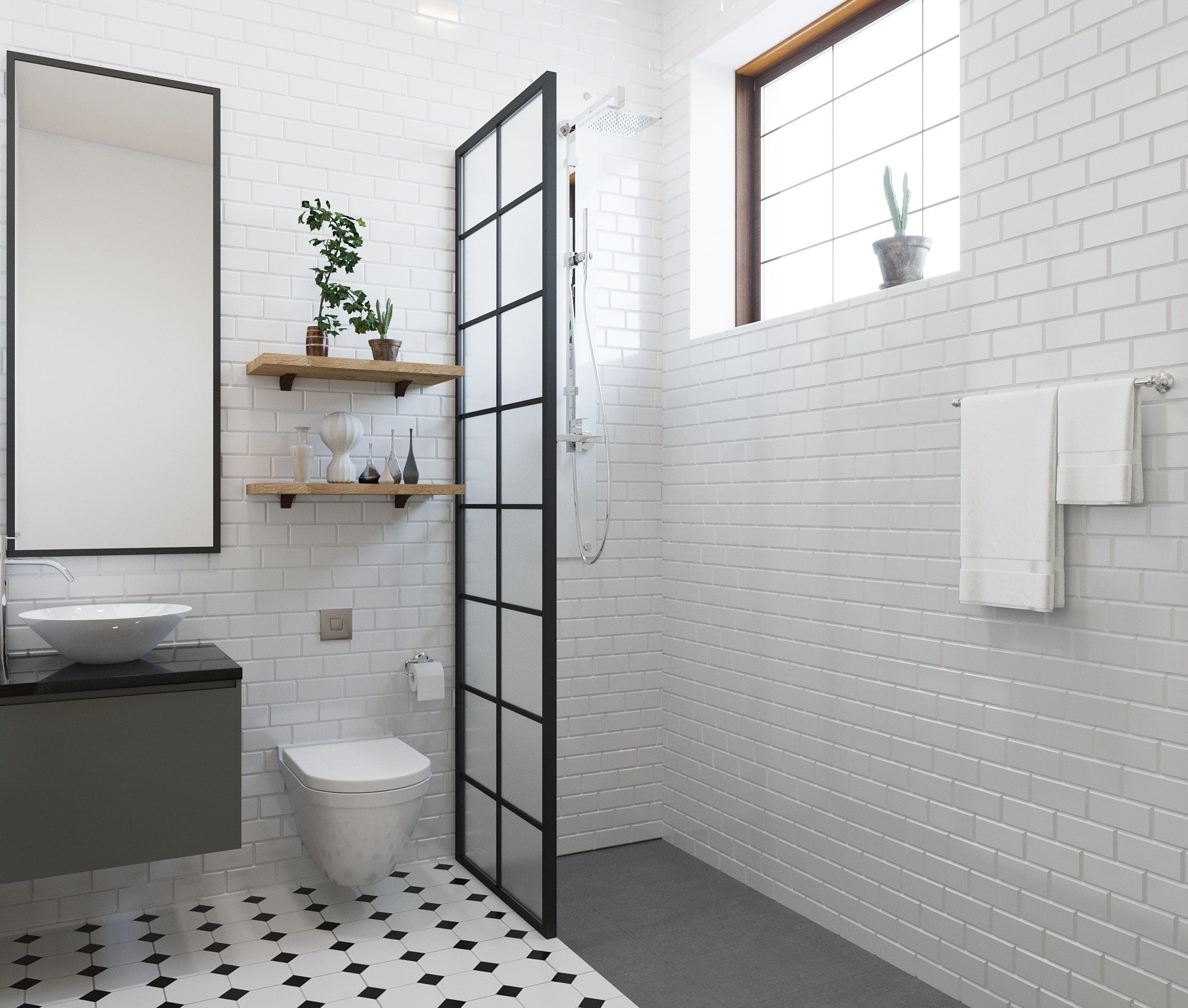 A black and white bathroom with a curbless shower, which ponders the question of whether or not curbless showers are worth it.